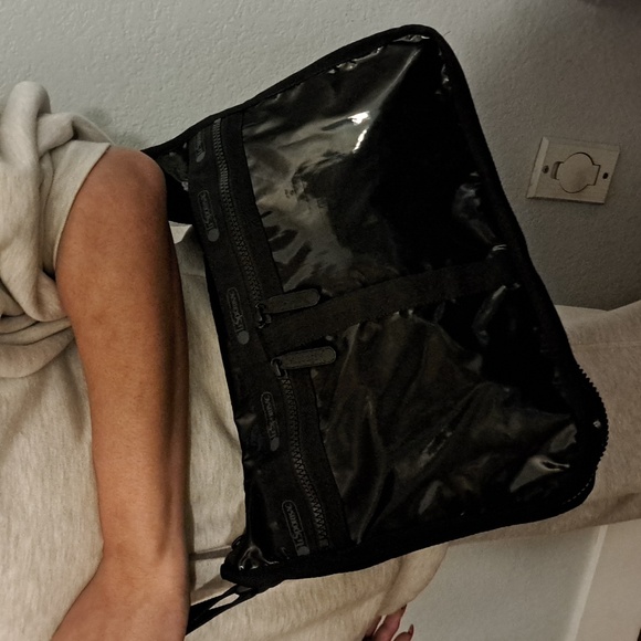 LeSportsac Deluxe Everyday Bag in a black shine or patent finish. - Picture 5 of 13